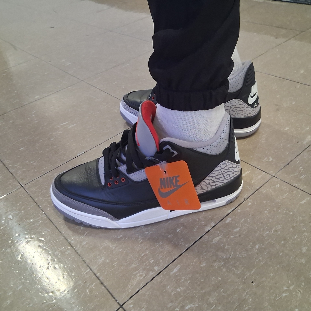 Nike Black and White Sneakers with Red Accents